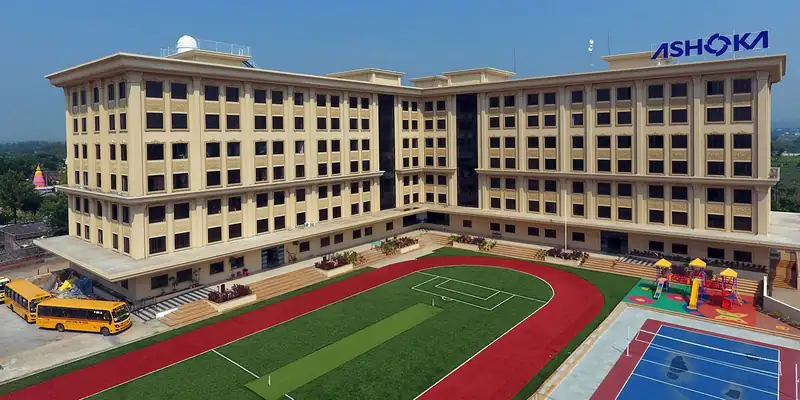 The Ashoka Group of Schools campus at Arjun Nagar, Nashik, with its sports ground and running track