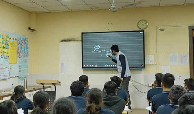 An IIT Medico Guide classroom with a smart board