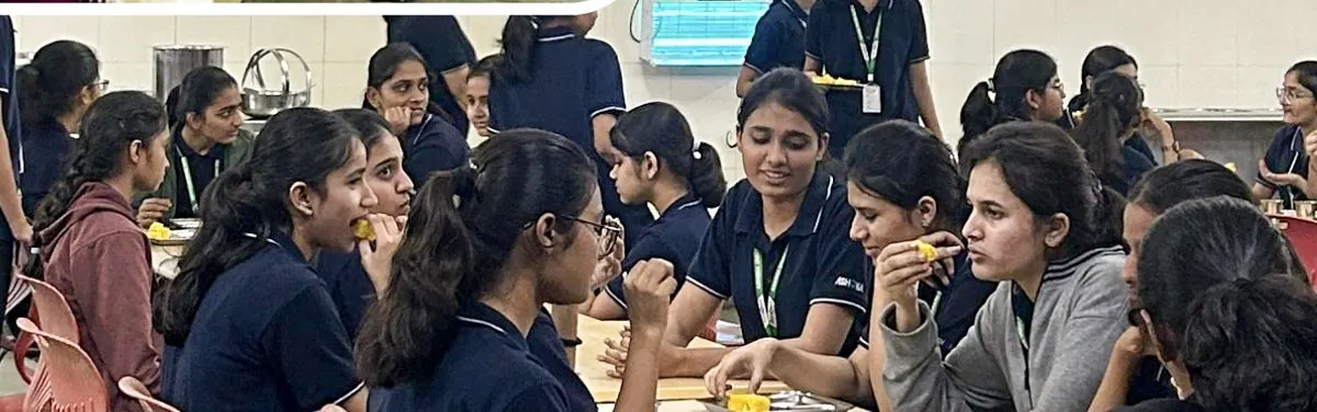 Girl students at lunch in the campus mess