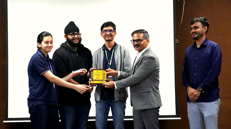 Dr. Ravinder Singal, IPS, presents the Academic Excellence award to IIT Medico Guide class toppers (photo 1 of 13)